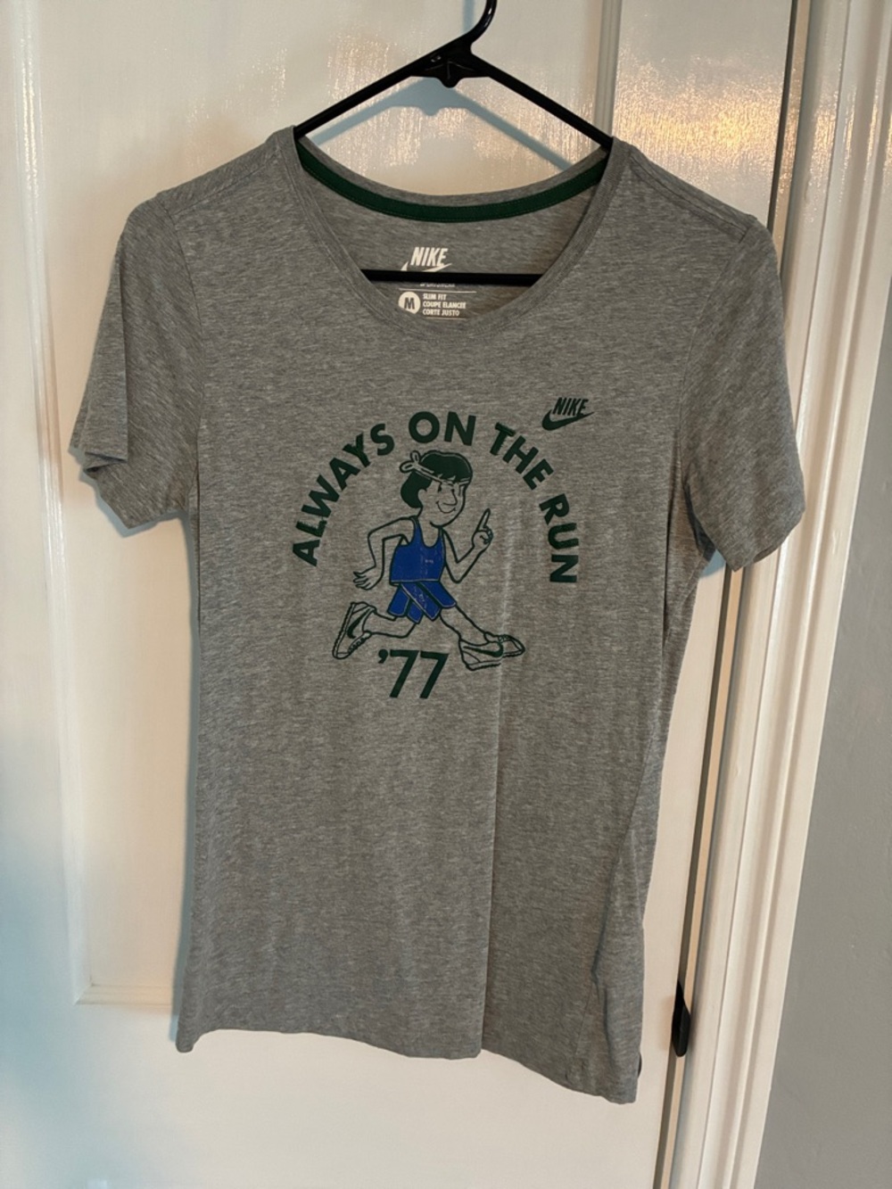 Nike Grey Short Sleeve Tee with Green Trim and Blue Runner Graphic